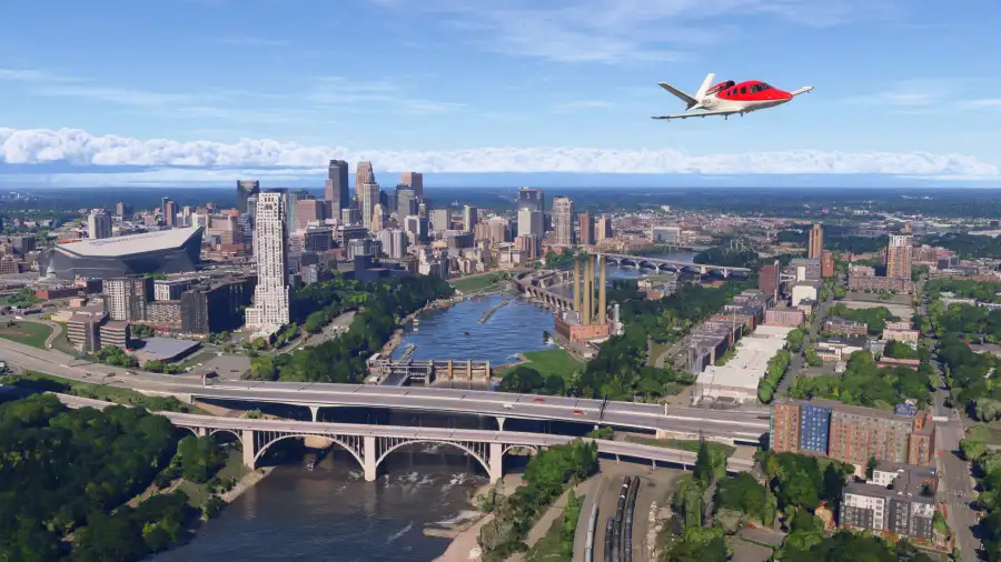 Microsoft Flight Simulator 2024 City Update 15 中飞越明尼阿波利斯城市天际线的飞机
